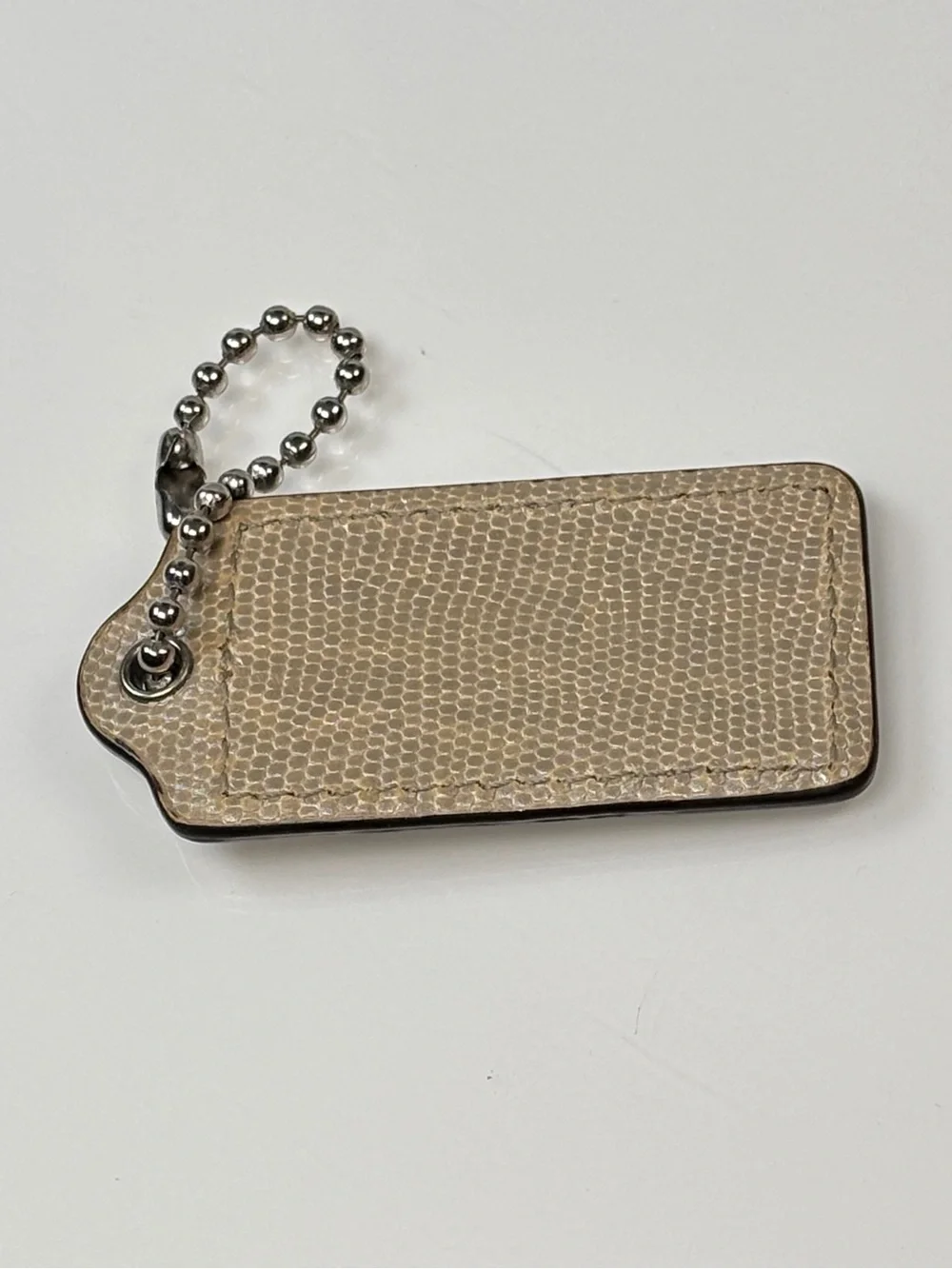 Coach snake embossed tan leather beige hang tag brown Silver chain 2.5 x 1.25 I